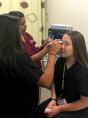 High school students engaged in medical skills training at Advanced Emergency Medicine