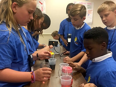 Students participate in a maker center challenge at NYLF Pathways to STEM Alumni