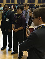 Students listen to an engaging demonstration from an industry professional at NYLF Engineering, an Envision summer program for high school students.