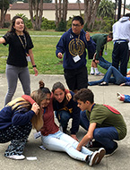 Students participate in a simulation and gain real-world medical skills at NYLF Medicine