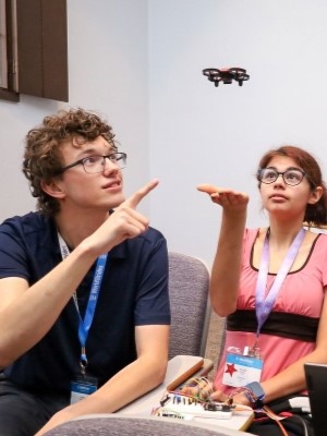 High school student engaged in an interactive workshop at Rice University's Aerospace & Aviation Academy