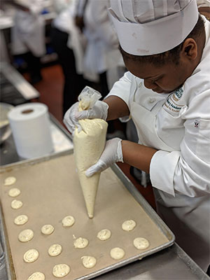 Culinary Program Student baking