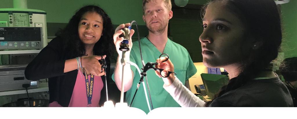 Students working in an operating room