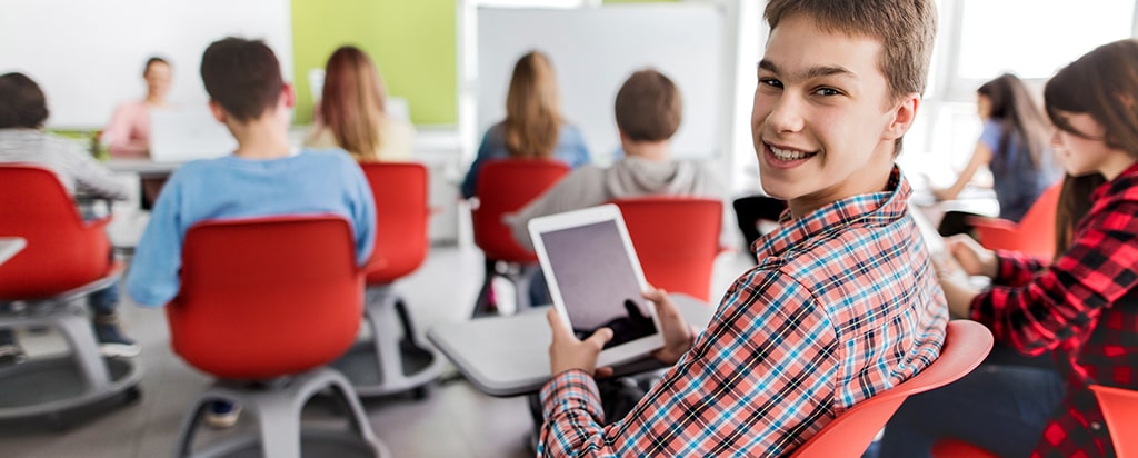 Happy student in new classroom