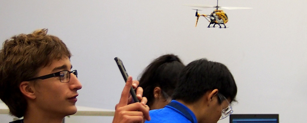 Envision Experience Alumni filming helicopter at NYLF Engineering