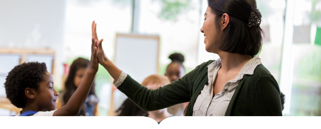 student gives teacher a high-five