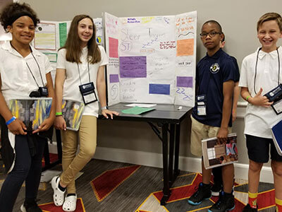 Students present their We the Future Project at the National Young Scholars Program